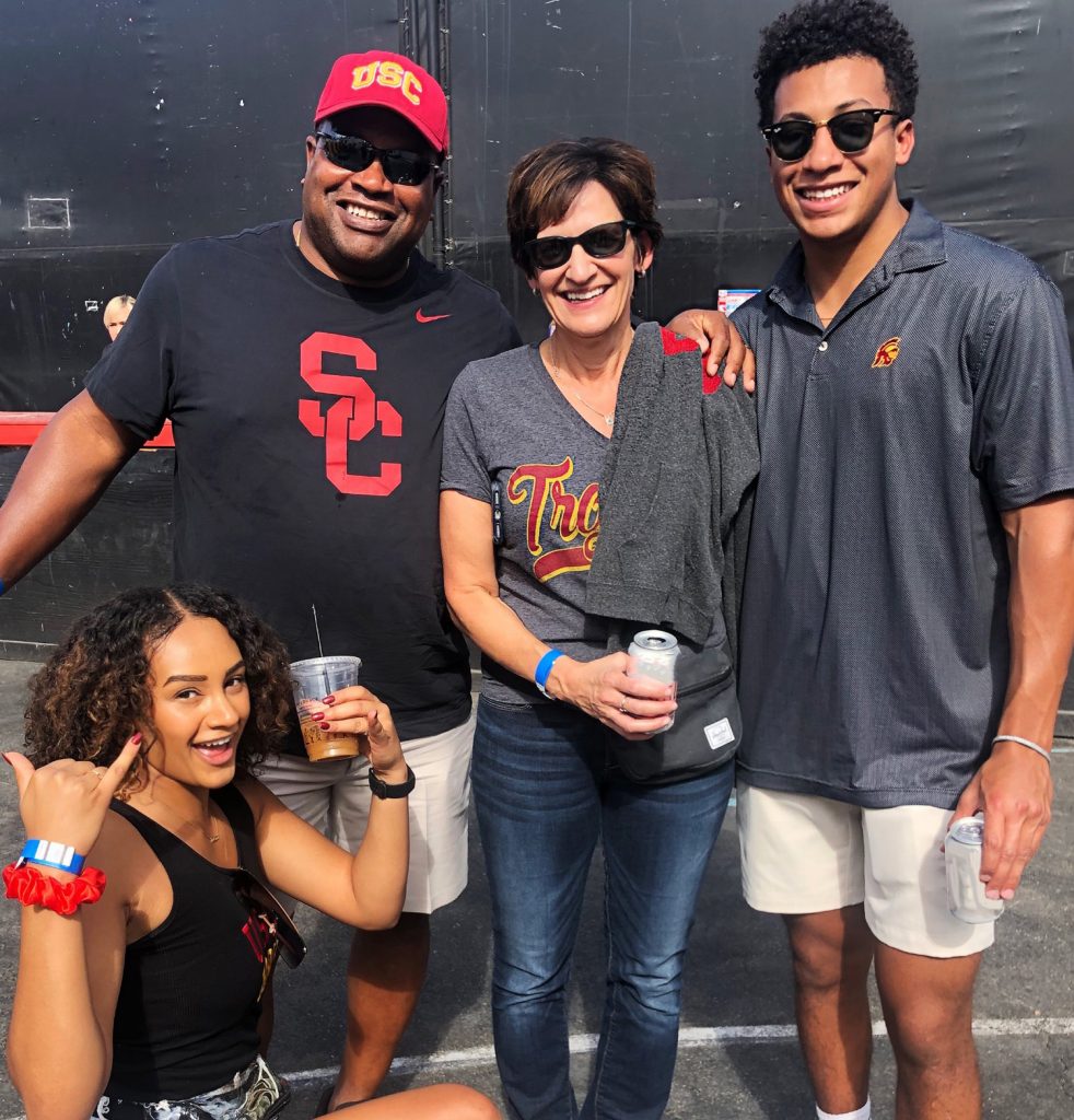 Kevin with his family at a USC sporting event